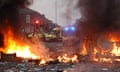 A vehicle burning during violent protests in Southport, Merseyside, on Tuesday 30 July 2024.