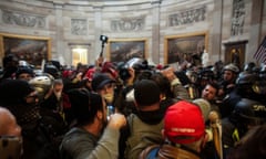 Trump supporters breach the US Capitol on 6 January 2021.