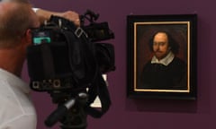 A cameraman films a portrait of William Shakespeare before an exhibition at the National Portrait Gallery in Canberra, Australia, in March 2022.