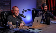 Joe Rogan, left, in a studio with the comedian Duncan Trussell, tops the UK chart.