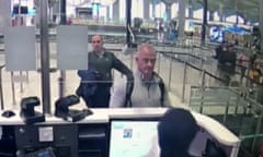FILE—This Dec. 30, 2019 image from security camera video shows Michael L. Taylor, center, and George-Antoine Zayek at passport control at Istanbul Airport in Turkey. A federal judge has ruled that the Taylor and his son, accused of smuggling former Nissan Motor Co. Chairman Carlos Ghosn out of Japan while he was awaiting trial on financial misconduct charges, can be extradited. (DHA via AP)