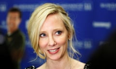 FILE PHOTO: Cast member Anne Heche smiles as she arrives for the premiere of the film "Cedar Rapids" during the Sundance Film Festival in Park City, Utah January 23, 2011. REUTERS/Lucas Jackson /File Photo