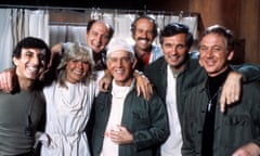 Jamie Farr, Loretta Swit, David Ogden Stiers, Harry Morgan, Mike Farrell, Alan Alda, and William Christopher on the set of M*A*S*H, circa 1978.