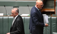 Prime minister Anthony Albanese walks past Australian opposition leader Peter Dutton