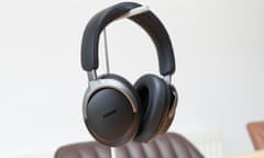 Bose QuietComfort Ultra Headphones hanging on stand