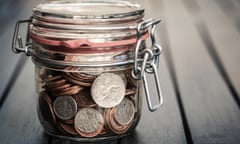 Coins secured in glass jar