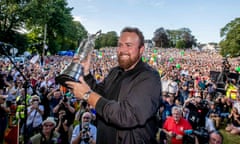 Shane Lowry shows off the Claret Jug at his homecoming party at the Clara GAA Club in Ireland.