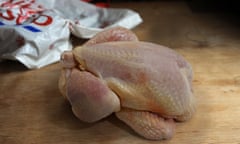 Tesco bag with stock image of a raw chicken