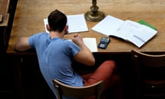 Overhead view of a student studying alone.