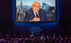 Former US secretary of state Henry Kissinger delivers remarks by video link on the closing day of the World Economic Forum, on January 20, 2017 in Davos. / AFP PHOTO / FABRICE COFFRINIFABRICE COFFRINI/AFP/Getty Images