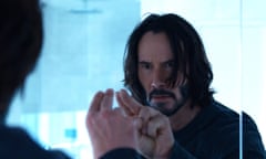This image released by Warner Bros. Pictures shows Keanu Reeves in a scene from "The Matrix Resurrections." (Warner Bros. Pictures via AP)