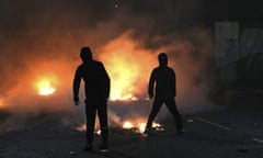 Nationalists and loyalists clash at Lanark Way in west Belfast, Northern Ireland.