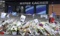 Flowers left in tribute to the victims of the attack at the Hyper Cacher supermarket in Paris in 2015