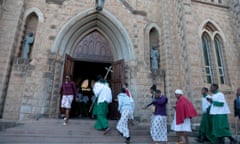 Altar boys and girls enter the Roman Catholic Cathedral in Harare, Zimbabwe, on 8 September 2019.