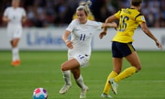 England's Lauren Hemp goes past Sweden's Filippa Angeldal