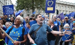 Demonstrators on an anti-Brexit March for Europe hold EU flags