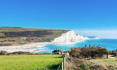 One of the Seven Sisters cliffs and Cuckmere Haven beach in the South Downs national park.
