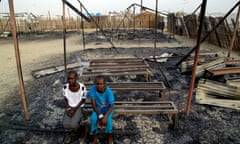 On 3 March 2016 in South Sudan, Chubat (right), 12, sits with her friend in the burned ruins of her school in Malakal Protection of Civilian site. The UNICEF supported primary school was burnt down in fighting on 17-18 February 2016, that left at least 18 people dead. Chubat and her friend used go to the school every day and enjoyed learning new things, especially during their English and math classes. 

470 children attended grades 1 through 6. The school had five classrooms and seven teachers who taught English, Social Science, Christian Religious Education, and Mathematics. Due to the lack of space in the PoC, the same classrooms were used for CFS activities in the afternoon.

In 2016, UNICEF launched the second phase of the Back to Learning initiative, targeting almost 600,000 children across the country. South Sudan has one of the largest number of children not attending school in the world.