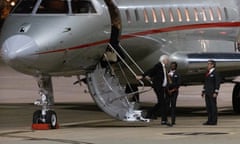 Assange stepping off an aircraft.
