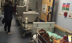 Trolley queue in a hospital corridor