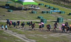 Scouts prepare to leave the campsite of the World Scout Jamboree in Buan, South Korea.