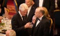 Bill Clinton (left) with the Northern Ireland secretary, Chris Heaton-Harris, at a banquet on the first day of a three-day conference to mark the 25th anniversary of the Good Friday agreement in Belfast.