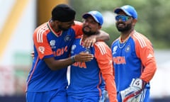 Arshdeep Singh of India celebrates with teammate Kuldeep Yadav after dismissing Matthew Wade of Australia during their T20 Cricket World Cup Super Eight match.