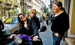 Two women on a scooter in Naples