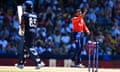 England's Adil Rashid celebrates after bowling USA's Aaron Jones