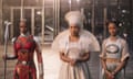 left to right, Ayo (Florence Kasumba); Ramonda (Angela Bassett) and Shuri (Letitia Wright) in Black Panther.