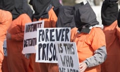 Protesters with Witness Against Torture participate in a rally at the Supreme Court in Washington, Wednesday, Jan. 11, 2017, calling for the closing of the Guantanamo Bay prison, marking the 15th anniversary of the first Afghan prisoners arriving at the detention center. (AP Photo/Molly Riley)