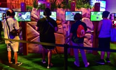 Gaming fans play Fortnite at E3 2018 in Los Angeles.