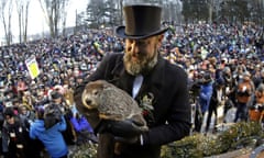 Al Dereume,John Griffiths Al Dereume<br>Groundhog Club co-handler Al Dereume holds Punxsutawney Phil, the weather prognosticating groundhog, in front of the crowd gathered for the 133rd celebration of Groundhog Day on Gobbler's Knob in Punxsutawney, Pa. Saturday, Feb. 2, 2019. Phil's handlers said that the groundhog has forecast an early spring. (AP Photo/Gene J. Puskar)