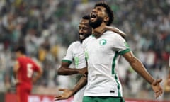 Saudi Arabia's Sami al-Naji (right) celebrates with Fahad al-Muwallad after scoring one of his two goals in a World Cup qualifying win over China this month.