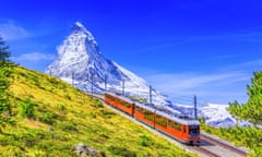 Zermatt, Switzerland. Gornergrat tourist train with Matterhorn mountain in the background. Valais region.<br>K26RPK Zermatt, Switzerland. Gornergrat tourist train with Matterhorn mountain in the background. Valais region.