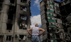 A man looks at buildings destroyed during Russian attacks on Borodyanka on the outskirts of Kyiv, Ukraine, Saturday, June 4, 2022. The image was part of a series of images by Associated Press photographers that was a finalist for the 2023 Pulitzer Prize for Feature Photography. (AP Photo/Natacha Pisarenko)