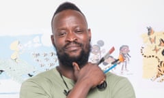 Illustrator Dapo Adeola in front of his artwork and holding paintbrushes