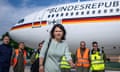 Annalena Baerbock in front of a plane.