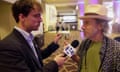 The Guardian's Travis Irvine offers some oil money to Harry Shearer at an event in New Orleans