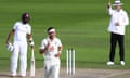 Stuart Broad of England celebrates after taking the wicket of Kemar Roach of West Indies.