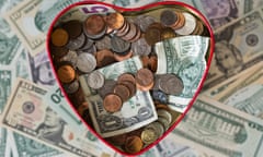 Heart shaped tin box with money