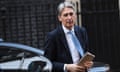 Budget 2017<br>Chancellor Philip Hammond arrives back in Downing Street, London, after he committed a dramatic U-turn over his planned Budget hike in National Insurance Contributions (NICs) for the self-employed. PRESS ASSOCIATION Photo. Picture date: Wednesday March 15, 2017. In a letter to Conservative MPs, the Chancellor said he would not proceed with the planned 2% increase in Class 4 NICs which he announced just a week ago. See PA story POLITICS Budget. Photo credit should read: Stefan Rousseau/PA Wire