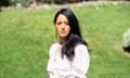 Journalist Rula Jebreal stands in a garden.