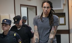 Brittney Griner is escorted from a courtroom after a hearing in Khimki, just outside Moscow, in August.