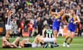 West Coast players celebrate the winning goal