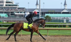 Mendelssohn canters in front of the famous spires at Churchill Downs racecourse.