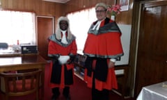 Justice David Lambourne with Sir John Baptist Muri, the former Kiribati high court chief justice, in legal attire in 2019
