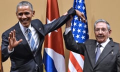 TOPSHOT - Cuban President Raul Castro (R) raises US President Barack Obama's hand during a meeting at the Revolution Palace in Havana on March 21, 2016. Cuba's Communist President Raul Castro on Monday stood next to Barack Obama and hailed his opposition to a long-standing economic "blockade," but said it would need to end before ties are fully normalized.   AFP PHOTO/Nicholas KAMM / AFP PHOTO / NICHOLAS KAMMNICHOLAS KAMM/AFP/Getty Images