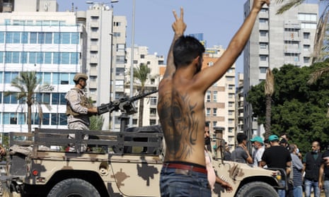 Gunfire and violence in Beirut as tensions erupt over blast investigation – video
