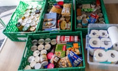 Crates of food and toilet rolls at Kingston Food Bank in Everyman Church in Kingston, London,  March 2022